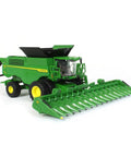 Prestige X9 1100 Farm Style Combine with die cast body and clear windows, featuring dual front wheels and folding C16F corn head