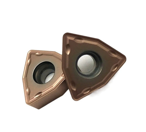 Heavy Duty Indexable Carbide Lathe Tool WCMT050308 for CNC Turning with a triangular cutting insert design.