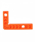 3 Inch Square Positioning Jig Boasts Dead Nuts Accurate 90 Degree Alignment For Cabinet Buildouts Woodworking Corner Clamps Diy No Fuss Assembly Projects Orange Tool on a white background.