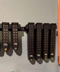 Lock Down Your Gear With This Heavy Duty Magazine Rack Precision Fit For Glock 17 19 26 31 32 33 34 Mags mounted on wall with magazines organized.