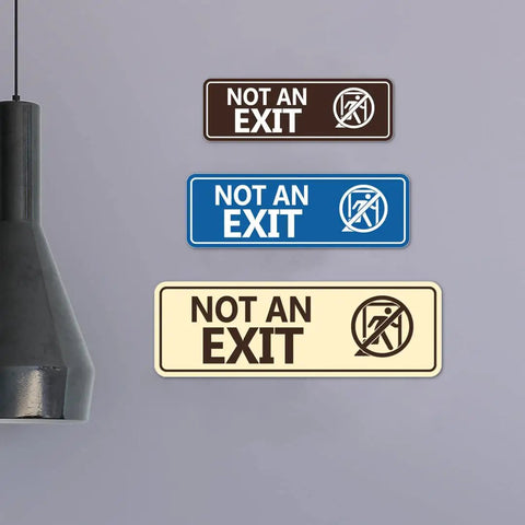 Not An Exit Stick Figure Sign Brushed Silver Small 2 Pack Clear Exit Icon For Quick Recognition In Emergencies Hallways Doors And Storage Areas For Public Buildings And Businesses. Wall sign set in three colors, shown on gray background.
