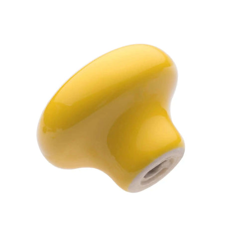 Six Piece Set Of Round Ceramic Kitchen Cabinet Knobs In Bright Yellow Make Totally Cute Furniture Drawer Pulls And Dreamy Cupboard Handles To Freshen Up Your Living Space Today - close-up of a bright yellow ceramic knob.