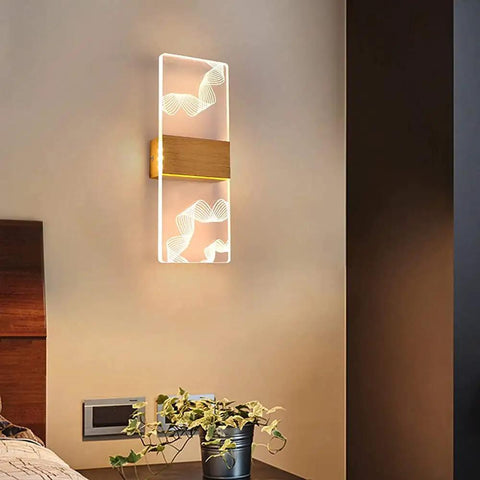 Modern Acrylic Led Wall Sconce With Up And Down Ambient Glow Includes A Smart Remote For Swift Dimming And Cool White Switches in chic bedroom setup.