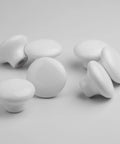 Ten Piece White Round Ceramic Drawer Knobs And Cabinet Pulls For A Quick Furniture Glow Up Featuring A Legit Glossy Grip And Super Chill Vibe To Make Your Cupboards Look Snazzy And Fresh, arranged view.