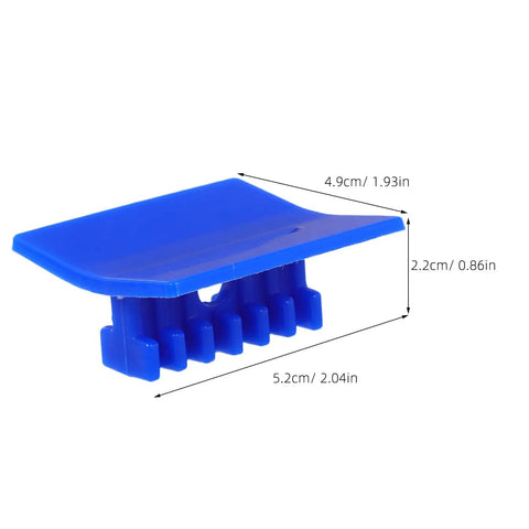 Close-up of blue plastic tab from Pro-Grade Four-Piece Automotive Dent Removal Kit With Plastic Dent Puller Tabs For Sheet Metal Pulling And Damage-Free Auto Body Repair