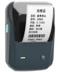 Jingchen Handheld Coding Machine For Clothing Price Tags And Jewelry Labels Auto Paper Bin With Smart Template Recognition Fast Labeling Printer showing a price label being printed.
