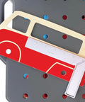 Vehicle Service And Repair Workbench Play Set With Realistic Tools For Young Builders cardboard car body on workbench panel.