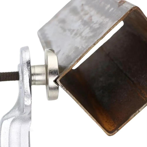Heavy Duty Multi Functional Welding F Clamp For Pipe And Flat Plate Alignment, showcasing quick change jaws clamping a steel pipe.