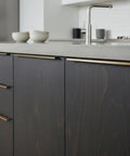 Top Shelf Ebony Black Oil Wood Stain For Patios And Decks Hella Durable Penetrating Formula That Gonna Make Your Wood Look Sick With A Smooth Matte Black Finish And Tough Protection on dark cabinets with gold handles.