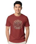 Cool Engineer T Shirt With Vintage Gear Emblem For Garage Projects And Mechanical Gifts Featuring Classic Badge Artwork On Soft Tee, worn by a man.