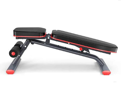 Side view of adjustable folding dumbbell bench for home gym with large non slip foot pads, stable leather cushioned surface, thick foam pad.