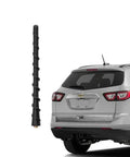Direct Replacement 7 Inch Roof Radio Antenna Mast for Chevrolet Equinox Traverse Volt Cruze and Trax near rear view of Chevy SUV