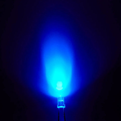 Blue 3mm pre wired LED diode illuminated, emphasizing brightness and clear round lens for automotive dash illumination projects.
