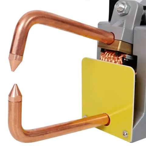 Close-up of copper tips on Portable Steel Sheet Metal Spot Welder Handheld Welding Tool With Copper Tips, Heavy Duty Iron Weld Up To One Eighth Inch Thick For DIY Metal Fab And Auto Body Repair.
