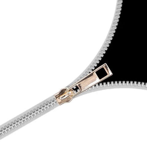 Close-up view of light gold zipper slider from the 5 Piece Zipper Sliders Set For Quick On The Go Fixes Detachable Reusable Zipper Pulls Replacement Kit