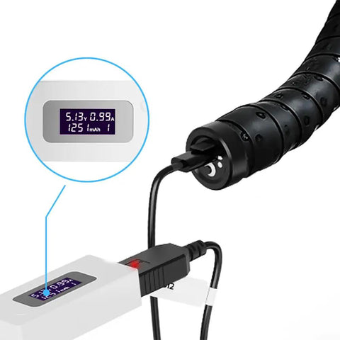 USB Charging Cable For Di2 8070 Shifters And Battery Charger Adapter plugged into bike tech display, close-up view