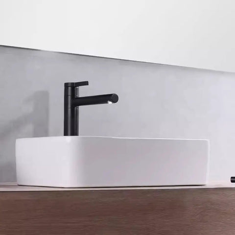 USZWBY Vessel Sinks Modern Minimalist Table Basin On The Counter Rectangular Washbasin Ceramic Art Bathroom Bowl Sink with black faucet.