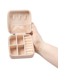 Open pink Propeller Inspired Aviation Jewelry Travel Case Pink With Plush Lining Compact 4x4x2 Inch showing compartments.