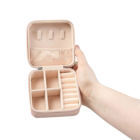 Hand holding open Stearman Pre WWII Trainer Aircraft Jewelry Travel Case Pink Ultra Compact 4x4x2 Inch Jewelry Box With Soft Plush Lining