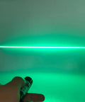 520nm green laser line module, hand-held, emitting a horizontal alignment line.