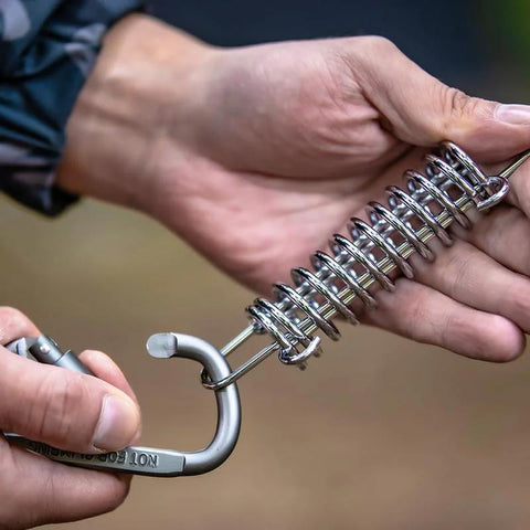 Tent springs 10-pack: 304 stainless steel with carabiner hook for tarps and awnings, close-up view