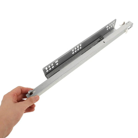 Hand holding Whisper Quiet Drawer Slides for cabinets and drawers, beefy cold rolled steel build with beast load bearing.