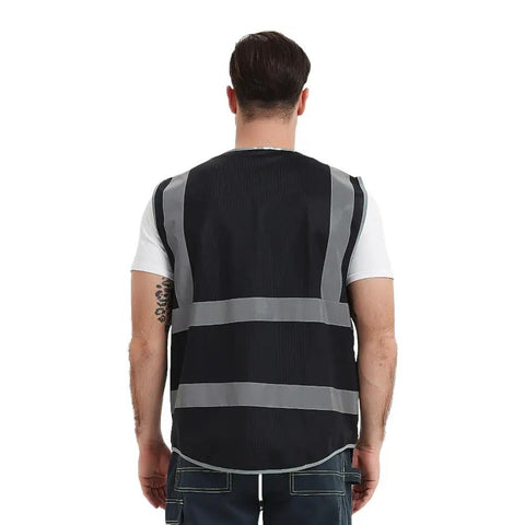 Back view of Rock Solid 9 Pocket Reflective Safety Vest designed to handle the daily construction grind with spacious zippered stash bins.