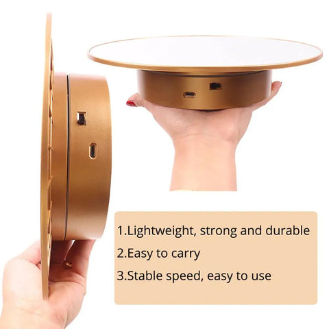 Heavy Duty 360 Degree Motorized Rotating Display Stand Turntable For Mannequin Heads And Wigs in hand, showcasing USB ports and gold finish.