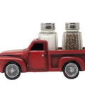 Red Pickup Truck Salt And Pepper Shaker Set For Farmhouse Kitchen Decor, rustic resin figurine with two glass shakers in truck bed.