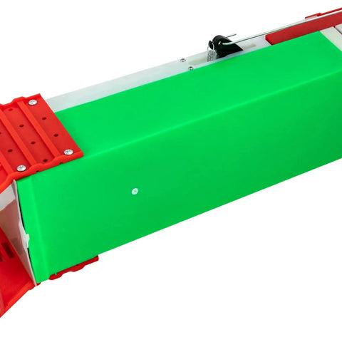 Close-up of Handheld Garden Seeder And Planter Tool with adjustable seed slots and green panel for precise sowing.