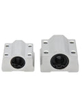 Hardened Steel Guide Blocks for Four Pack Linear Motion Bearing Slides, showing two sizes with smooth bushings, ideal for CNC setups.