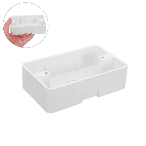 Five Piece Surface Mount Outlet Boxes With No Sweat Setup And Ultra Slim Single Gang Build showing white plastic box in hand.