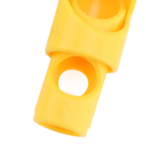 Foam Pipe Cutter Tool Six Piece Set for Precise Insulation made of durable plastic, close-up view of yellow fitting piece.