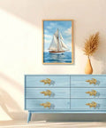 Crocodile Shaped Cabinet Knobs Set Of 4 in zinc alloy vintage gold on blue dresser with nautical painting in background