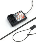 FS-GT3B Transmitter And FS-GR3E Receiver 2.4GHz 3 Channel RC Remote System components including a black antenna and wire
