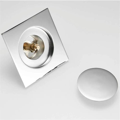 Ridiculously Durable Chrome Plated Brass Pop Up Floor Drain Plug For Bathtubs And Showers showing square design and push valve.