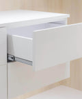 Open white drawer showing 22-inch soft-close drawer slides with metal ball bearing, highlighting side mount design in cabinet setup.