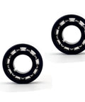 Two black pool cleaner turbine bearings with silver inner balls, 2-pack