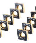 CCMT 21.51 MD Carbide Insert With CVD Coating For Steel Machining showing top view of multiple inserts with through holes and chip breaker design