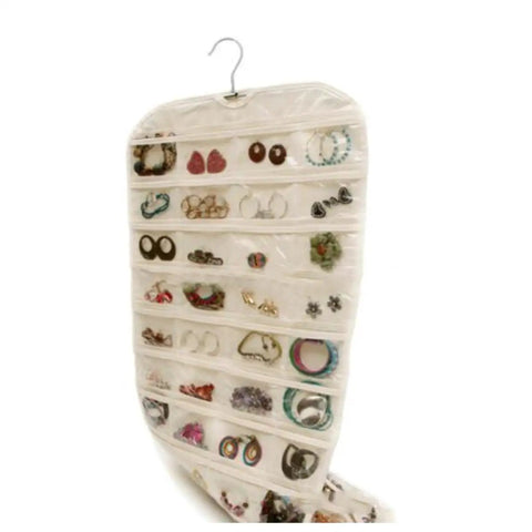 Double Sided Hanging Jewelry Organizer Bag With Eighty Clear Storage Pockets For Earrings Necklaces And Brooches Portable Closet Accessory Holder filled with earrings.