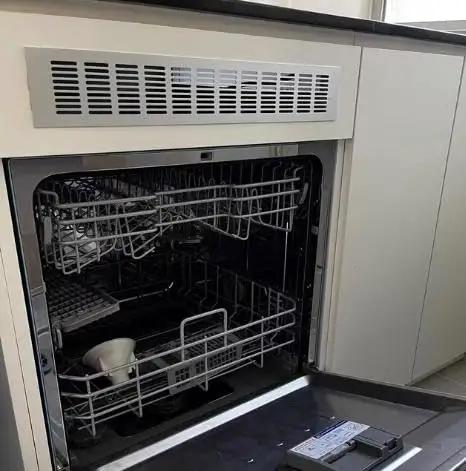Slick Full Size Drawer Dishwasher For Home With Concealed Touch Controls And Hella Quiet Wash Cycle, partially open showing interior and racks.