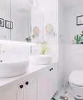 White bathroom with cabinets featuring Matte Black Cabinet Knobs 10 Pack 1.2 Inch Round Zinc Alloy Drawer Pulls For Dresser Cabinets Kitchens Modern Single Hole Hardware Sturdy Durable Knobs For Doors And Drawers