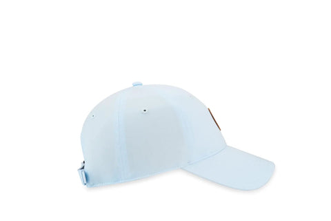 Light blue baseball cap, side view, with adjustable strap and subtle stitching on brim.