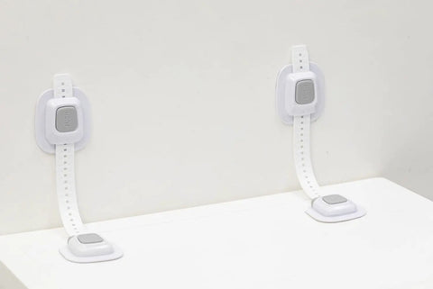 White upgraded no drill furniture wall anchors for baby proofing and child safety, 4 pack cabinet strap locks with adhesive plates.