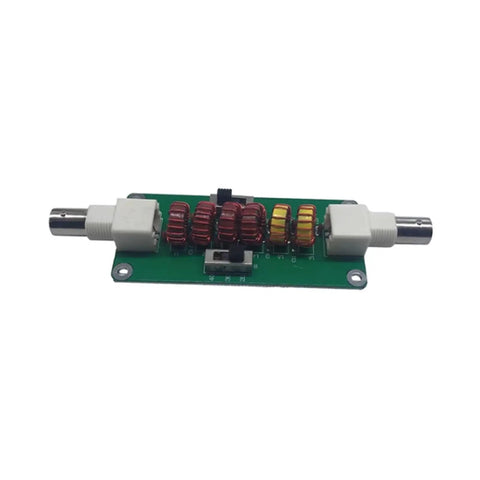 20m 30m 40m CW Low Pass Filter For Radio And TV Broadcasting Cranks Up Crystal Clear Audio And Cuts Out Unwanted Frequencies With 7 MHz 10 MHz And 14 MHz Range For Pristine Signals, compact green circuit board with connectors and coils.