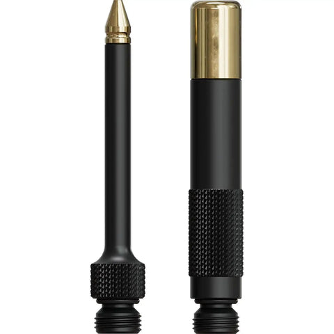 Close-up of brass needle and black fittings from Four In One Grease Injection Gun Kit With Brass Needle Tip And Zerk Fittings For Precise Grease Application Four Loading Options Include Bulk Reservoir Standard Paper Cartridges And Threaded Cartridges Pro Grade Handheld Tool.