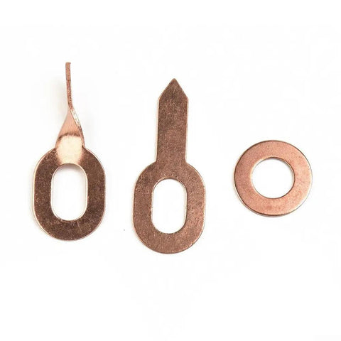 Copper plated steel pulling tabs from Mixed Spot Welder Dent Repair Pad Set for auto body repair, including washers.
