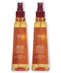 Two bottles of Turn Up The Heat Protectant Spray 8.5 Oz Pack Of 2 for flat irons and curling irons, red spray bottles standing.