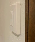 Side view of installed 1-Gang Non-Metallic Shallow Surface Box Extender Five Eighths Inch Lift Paintable White For Outlets And Switches