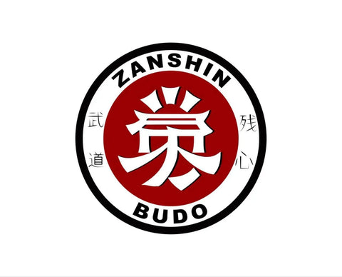 Martial arts logo with red circle, bold "Zanshin Budo" text, and Japanese characters on a white background.